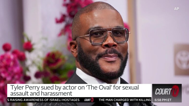 Glamorous-looking bald middle-aged male at a fancy event